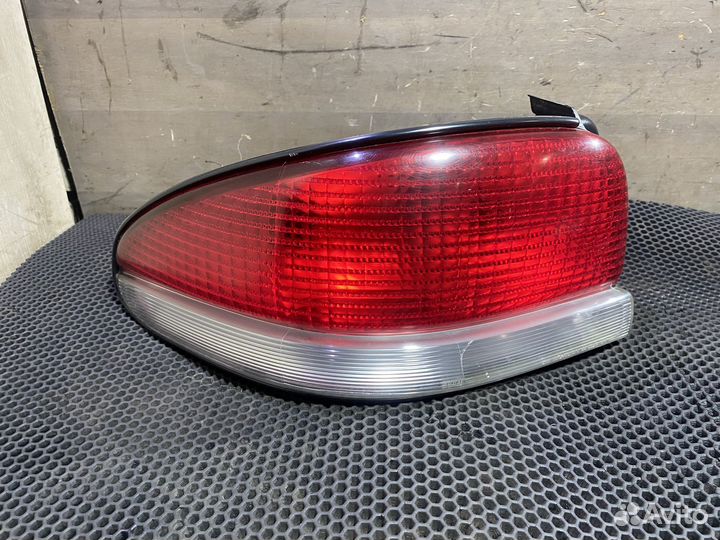 Фонарь задний левый Chrysler Cirrus Stratus