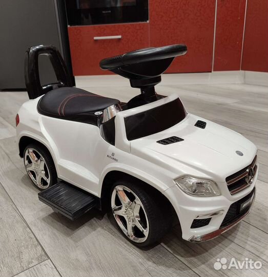 Машинка каталка толокар