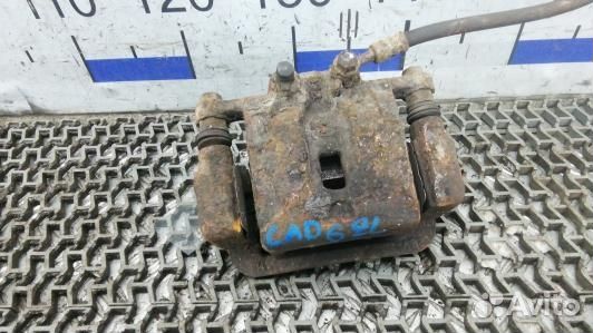 Суппорт тормозной задний левый KIA sorento 2 (CAD0