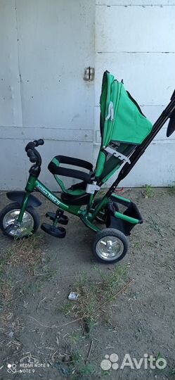 Трехколесный велосипед с ручкой