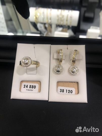 Серьги с бриллиантами и кольцо с бриллиантом
