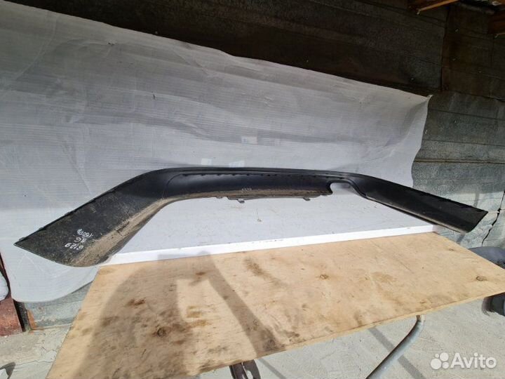 Спойлер (юбка) бампера задний Volkswagen Passat B6