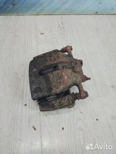 Суппорт тормозной перед Renault kangoo 2 Лев