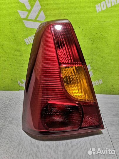 Фонарь задний левый Рено Логан
