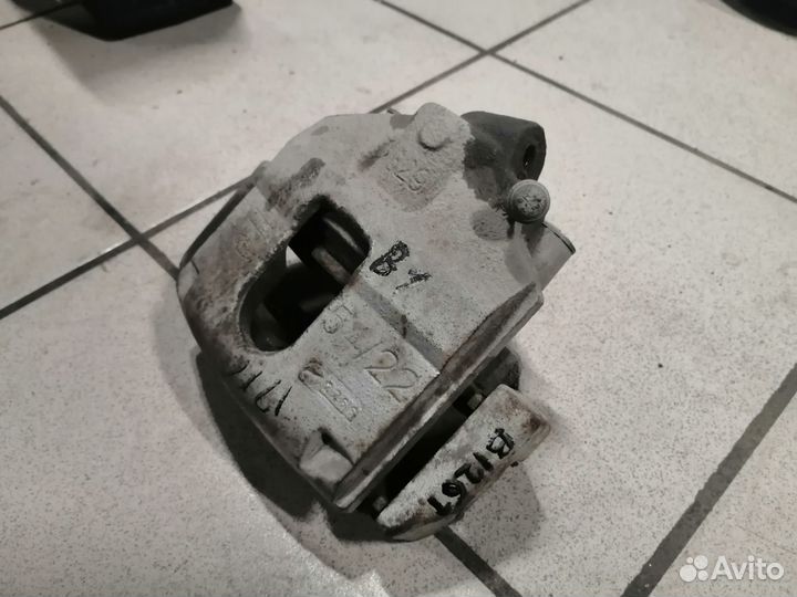 Суппорт тормозной передний левый Форд Фиеста