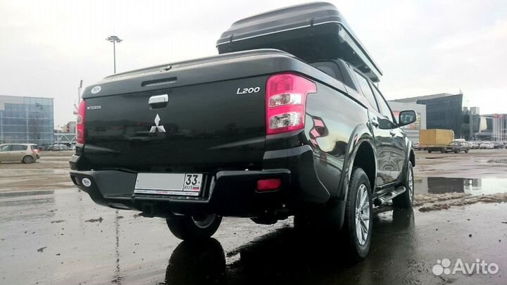 Силовой бампер задний Митсубиси белый