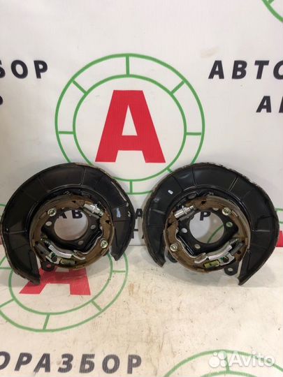 Механизм ручного тормоза задний Mitsubishi Lancer