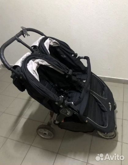 Двойная коляска