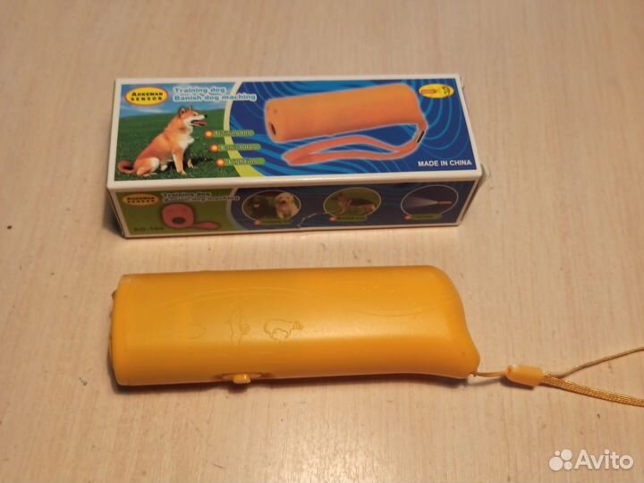 Фонарик и отпугиватель собак