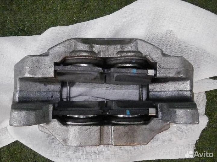 Суппорт тормозной передний левый Cadillac Escalade