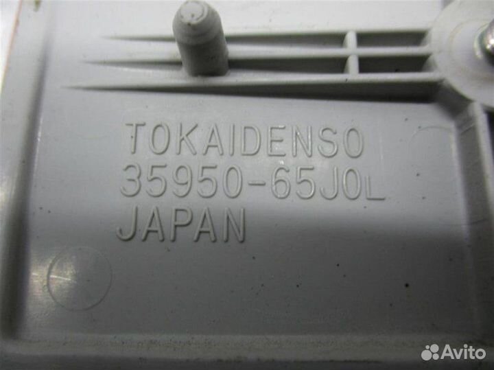 Отражатель в бампер задний левый Suzuki Grand