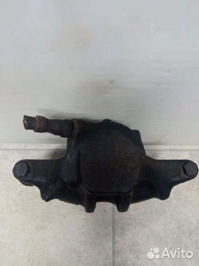 Суппорт тормозной передний правый Volkswagen Polo