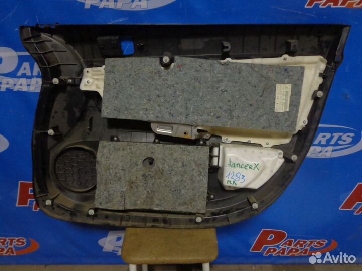 Обшивка двери передняя левая Mitsubishi Lancer 10