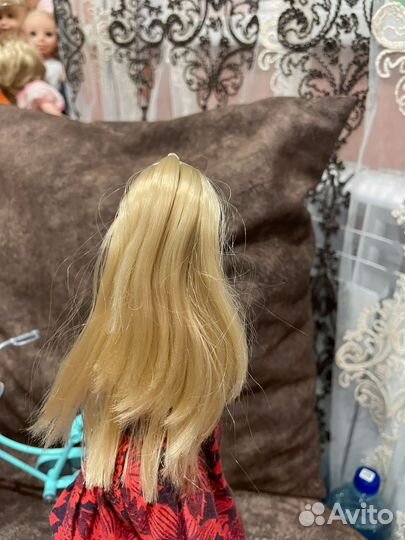 Кукла с велосипедом