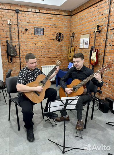 Репетитор по игре на гитаре онлайн