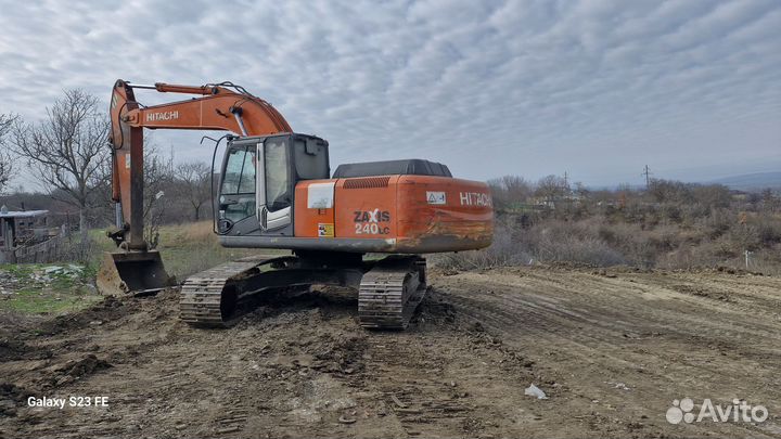 Услуги гусеничного экскаватора