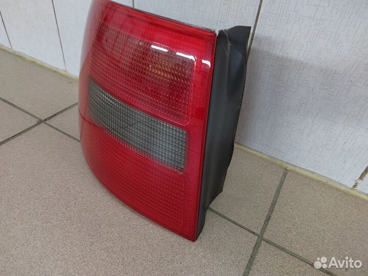 Фонарь задний левый Audi A6 C5 Avant дорестайлинг