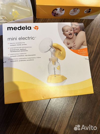Молокоотсос medela электрический