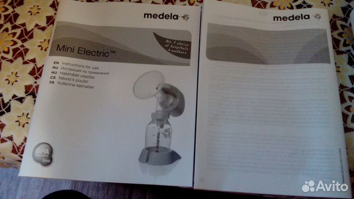 Молокоотсос medela электрический