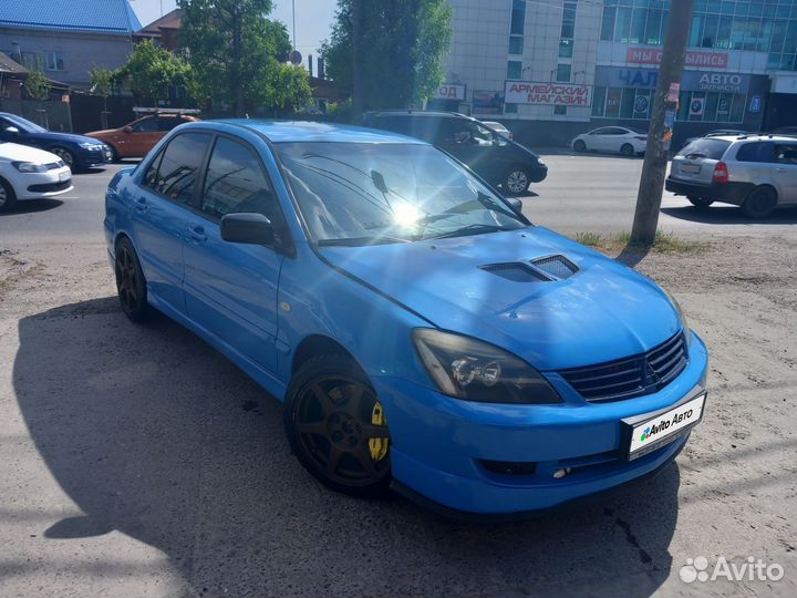 Mitsubishi Lancer 2.0 МТ, 2004, 2 000 км