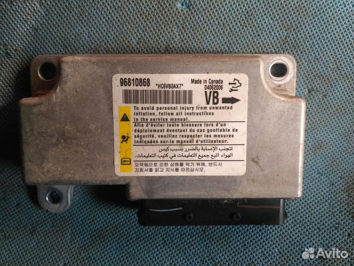 Блок управления airbag Captiva C-100