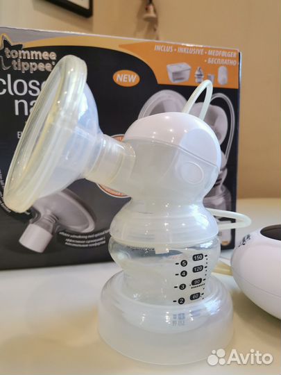 Электрический молокоотсос и стерилизатор