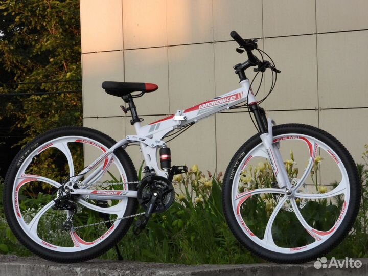 Складной велосипед на литых дисках