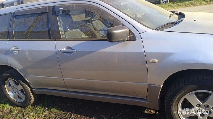 Стеклоподьемник двери Митсубиси Оутлендер 1