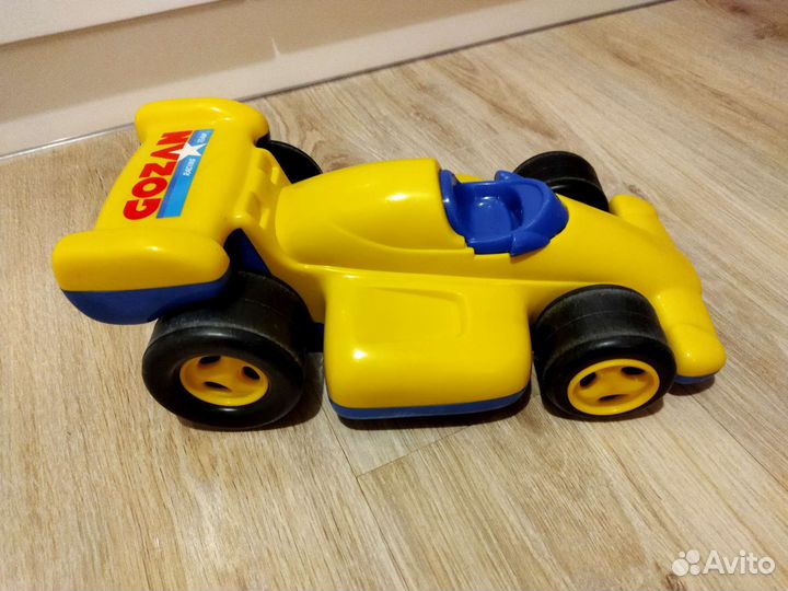 Игрушка машинка-каталка