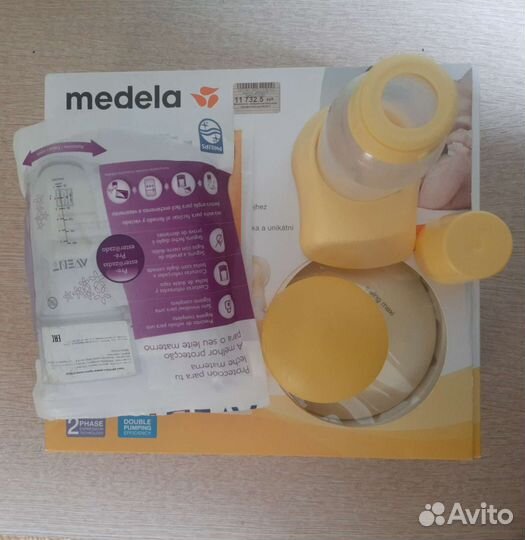 Молокоотсос электрический двойной medela