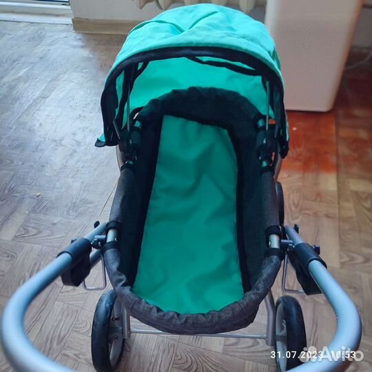 Игрушечная коляска для кукол