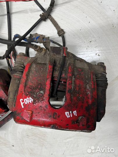 Суппорт передний левый правый Chery Fora a21