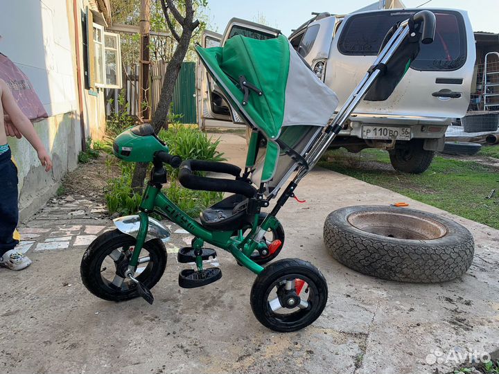 Детский велосипед с ручкой