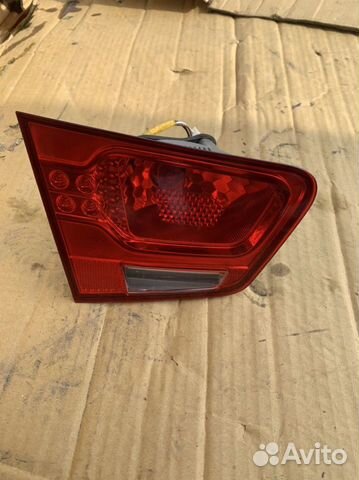 Фонарь левый в крышку багажника Kia Cerato 2