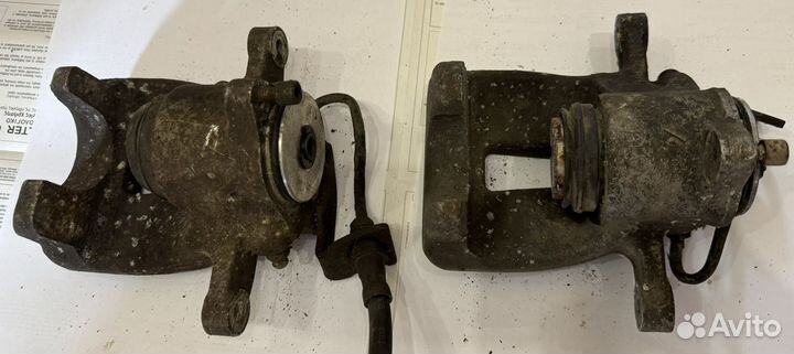 Суппорт тормозной задний Volkswagen Passat B6