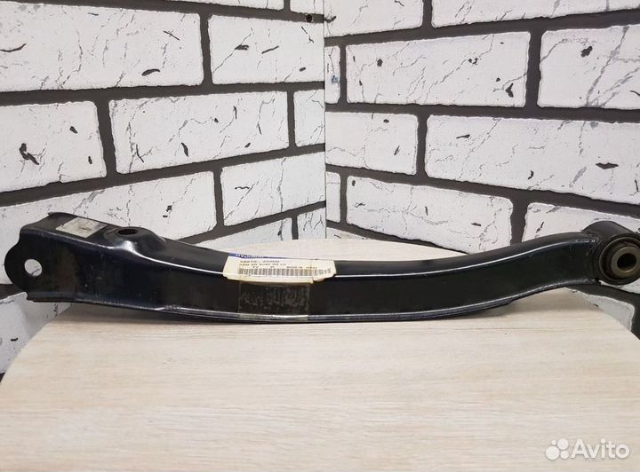 Рычаг правый задний нижний