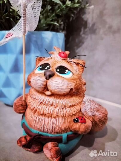 Кот с сачком