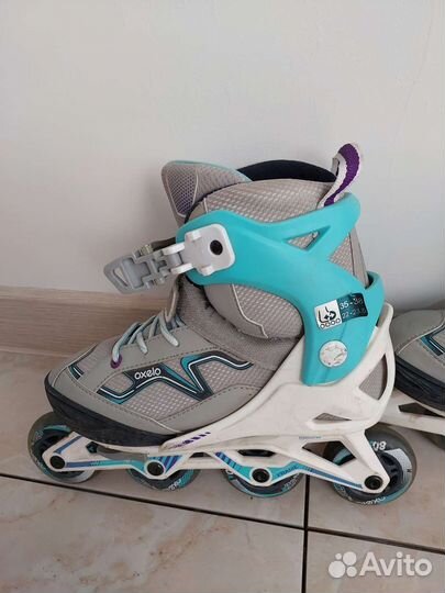 Роликовые коньки