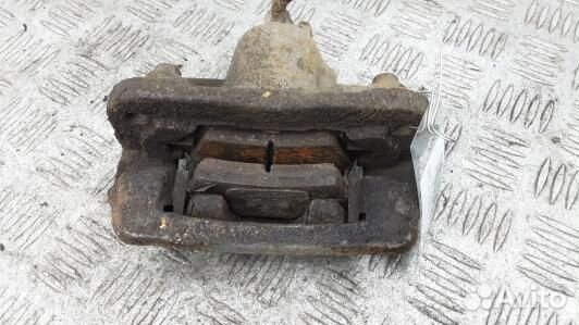 Суппорт тормозной задний левый KIA soul 1 (1UK18LS