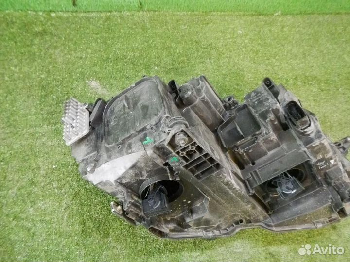 Фара левая Volkswagen Tiguan