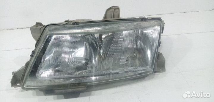 Фара левая Saab 9-5 1