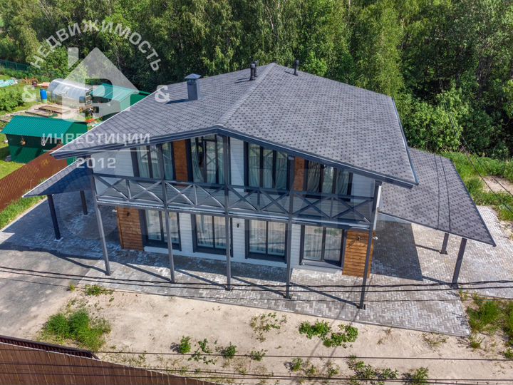 Коттедж 188 м² на участке 7,5 сот.