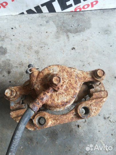 Суппорт передний левый Daewoo Nexia N150 1.5 2010