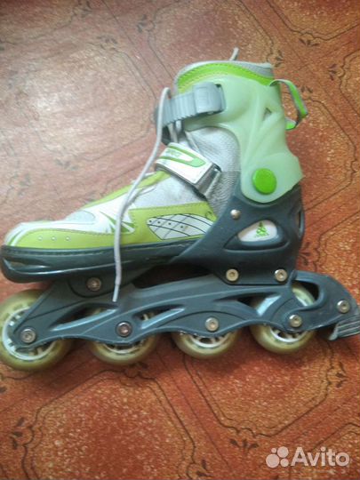 Роликовые коньки б/у