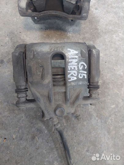Суппорт левый правый Nissan Almera G15