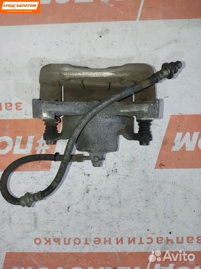 Суппорт тормозной передний правый Nissan Teana J32