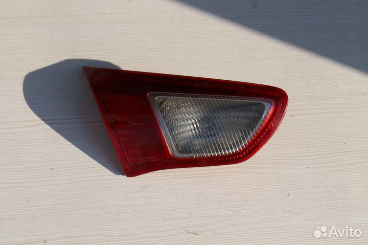 Фонарь заднего хода левый Mitsubishi Lancer 10