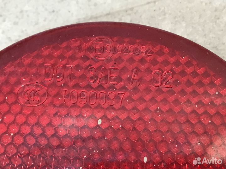 Отражатель в бампер задний левый Nissan X-Trail (T