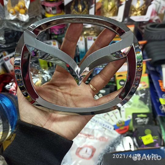 Эмблема Мазда