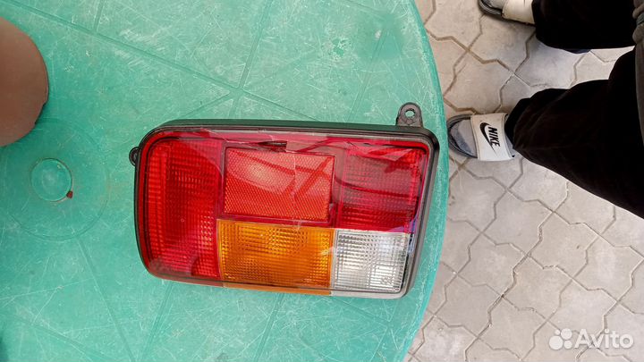 Фонарь задний 21213 новый в сборе